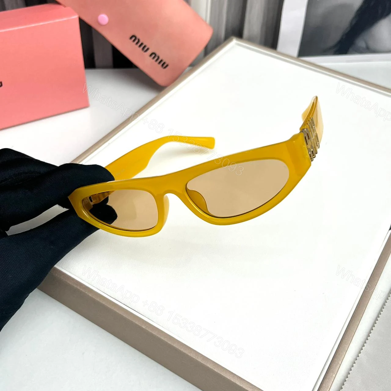 View 2 of Miu Miu Cat Eye Yellow Sunglass Universal Frame