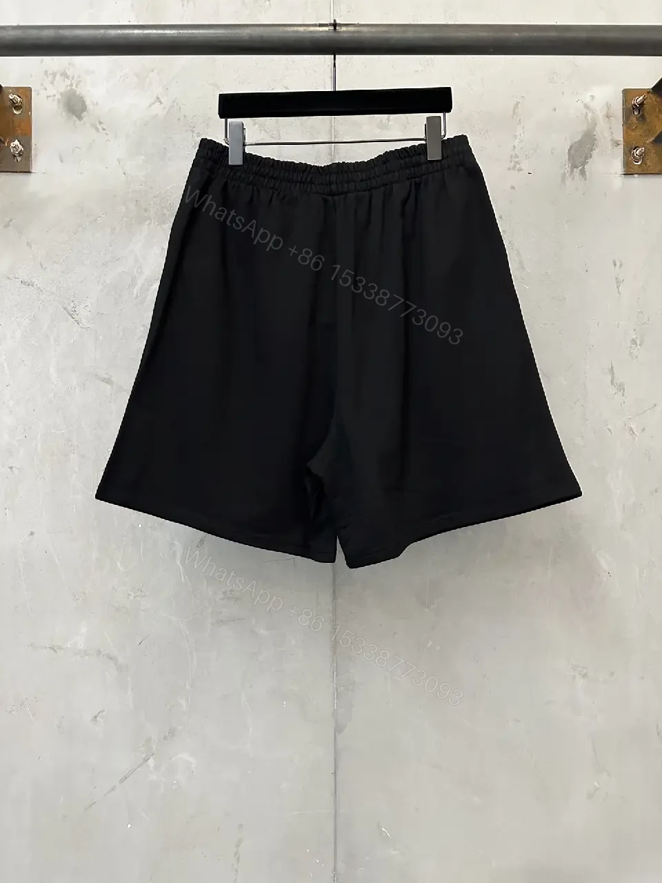 View 8 of black nylon shorts with logo motif for luxury everyday wear
