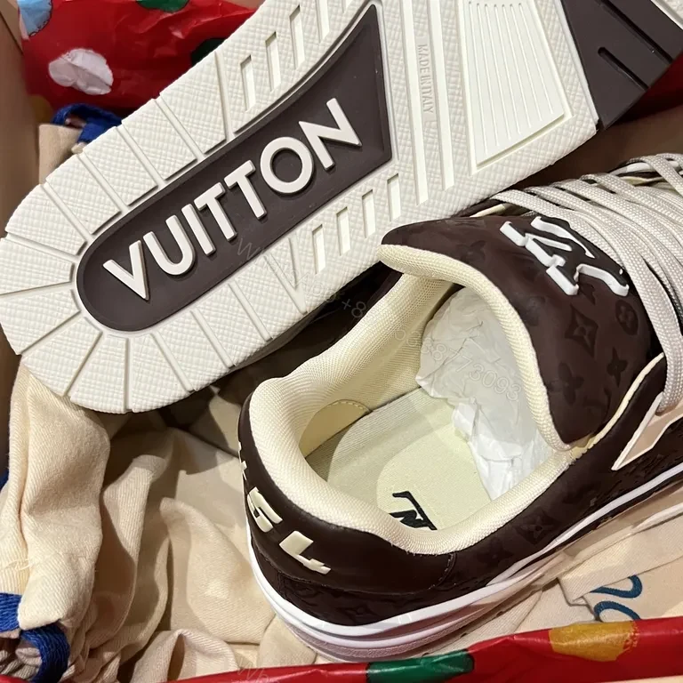 View 2 of Brown Leather Low-Top Sneakers with LV Monogram, White Trim and Sole