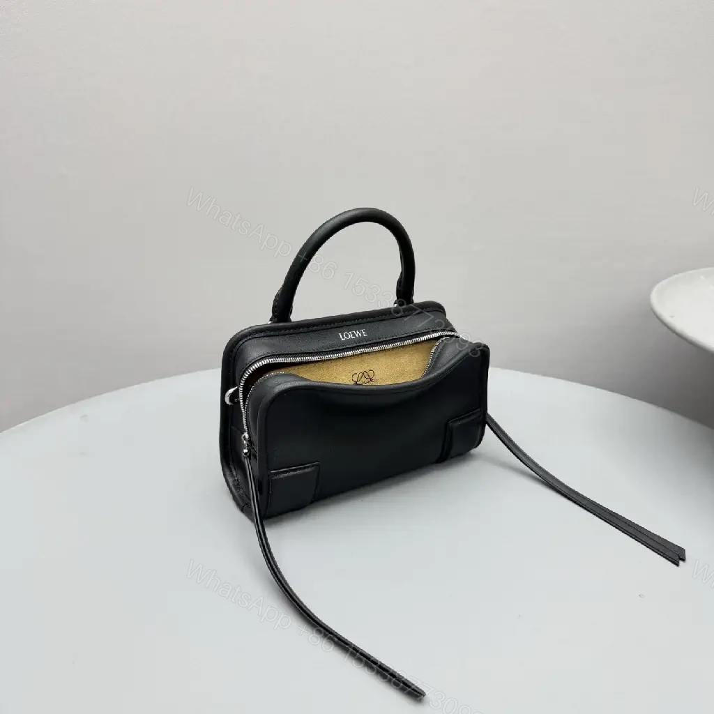 View 3 of Structured Black Leather Mini Bag | Compact, Versatile Carryall
