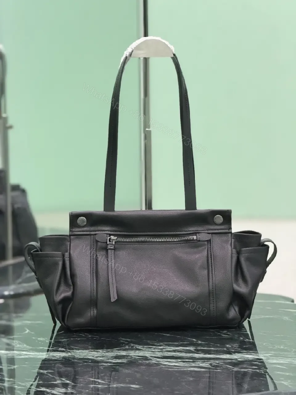 View 10 of Chic Black Leather Carryall: Structured Luxury Tote