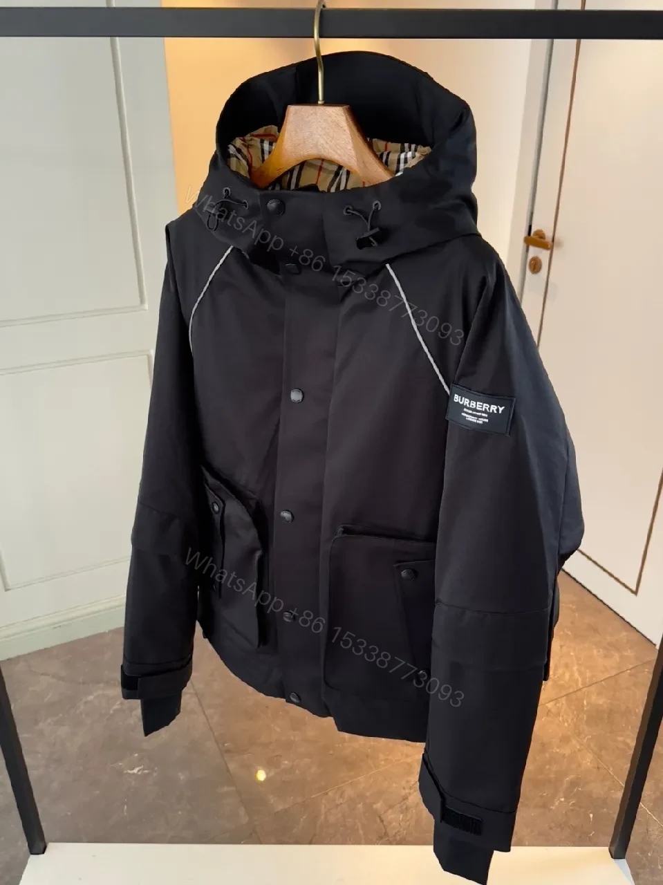 View 6 of Water-Resistant Black Parka with Plaid Lining Luxury-Utility Coat