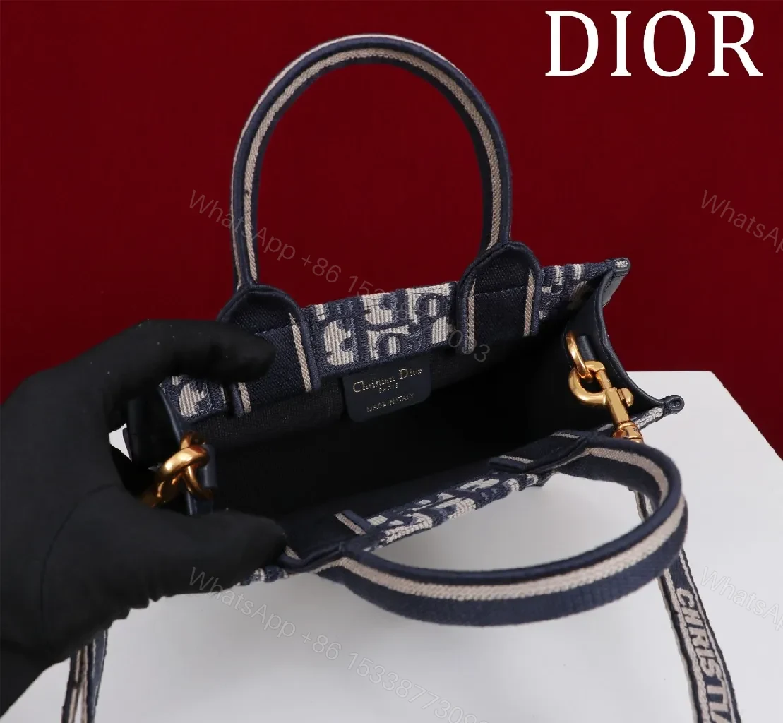 View 9 of Structured Monogram Mini Bag: Elegant Day-to-Night Crossbody