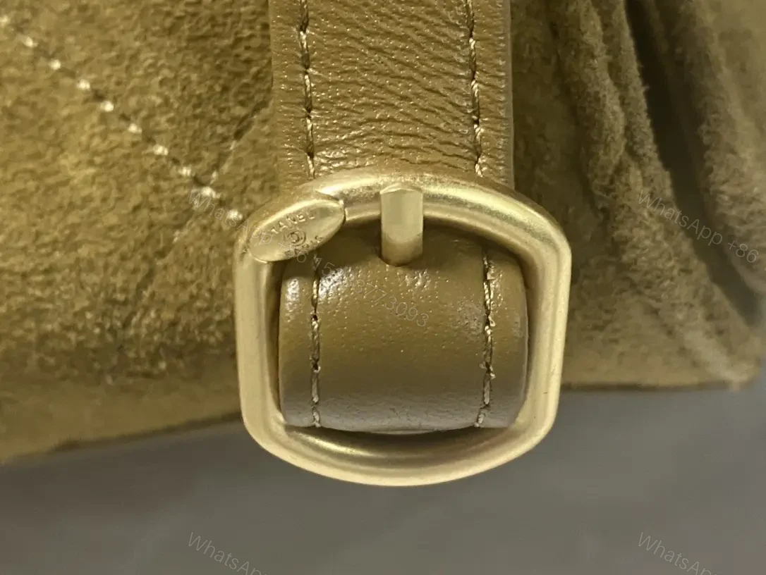 View 3 of Quilted Suede Bucket Bag with Gold Crest Detail
