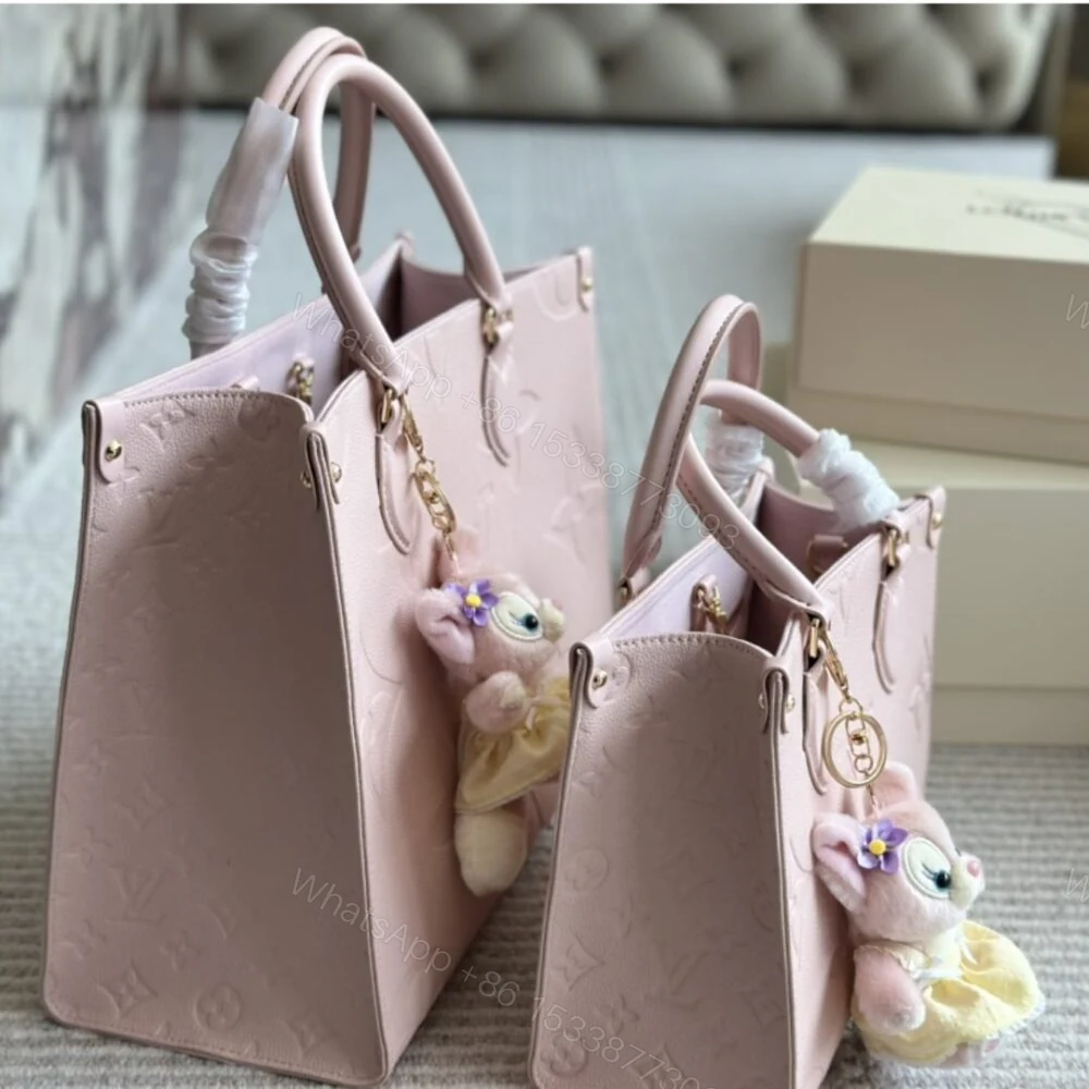 View 5 of Louis Vuitton Onthego PM Monogram Empreinte Pink Opale 25Cm M47135