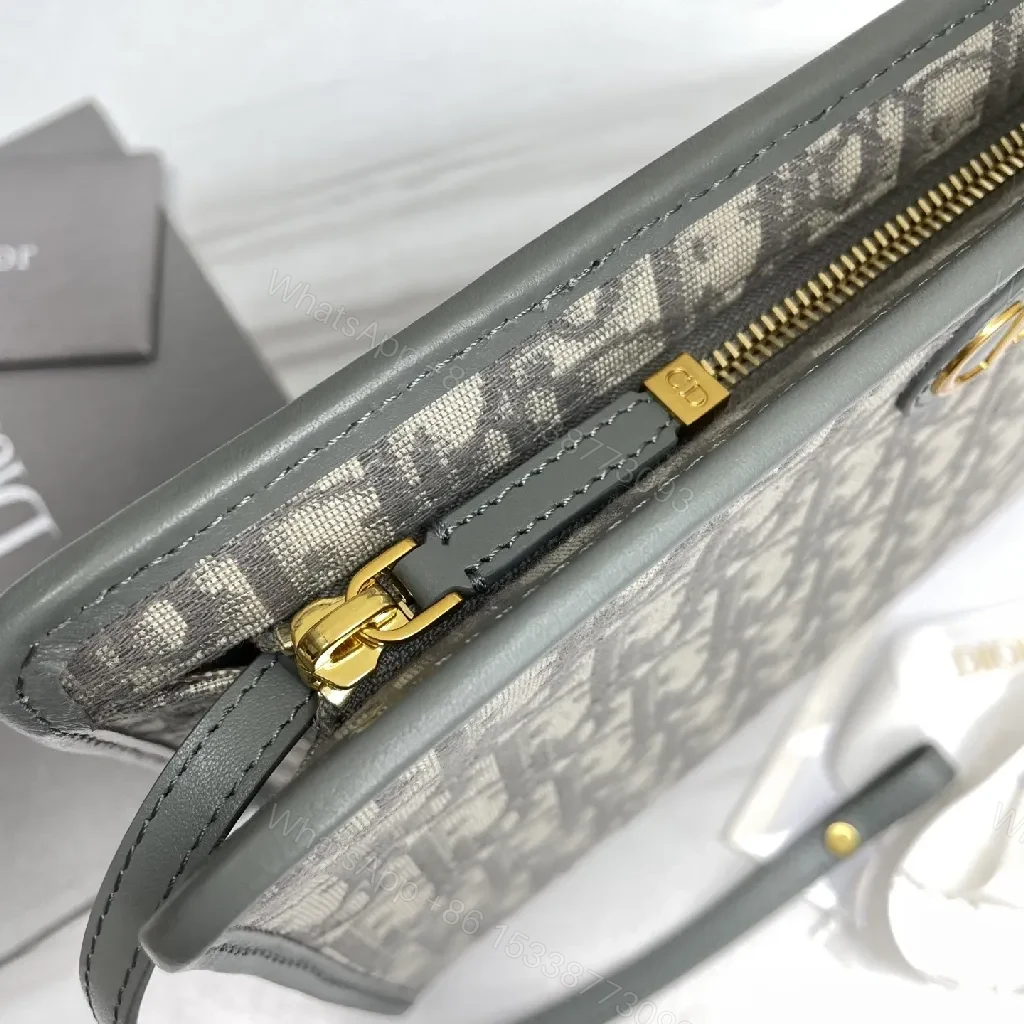 View 2 of Structured Monogram Wallet — Signature Pattern, Gold Hardware, Zippered Clutch