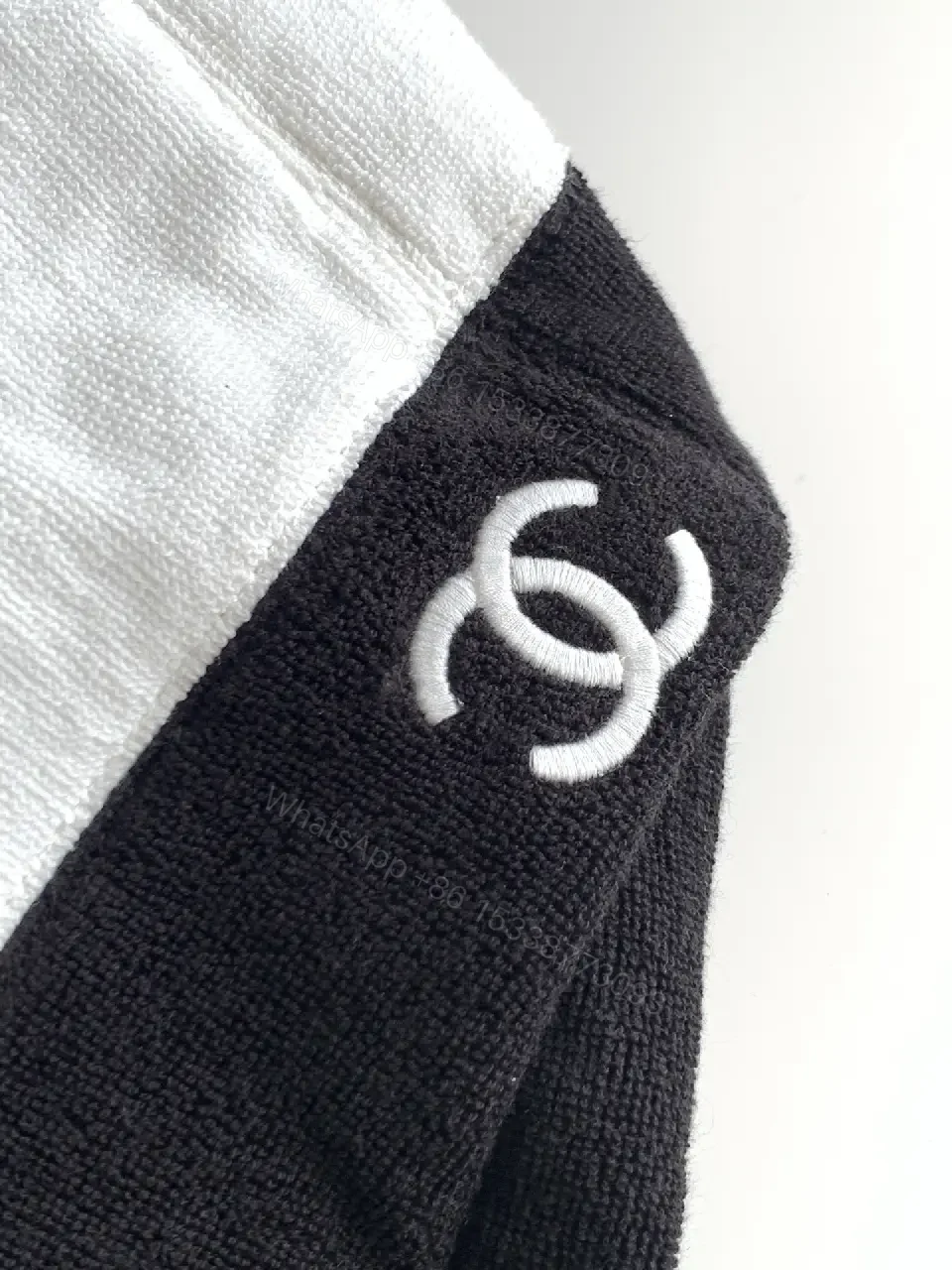 View 5 of White Fabric Handbag with Black Trim Slouchy Style Chanel Logo Tote