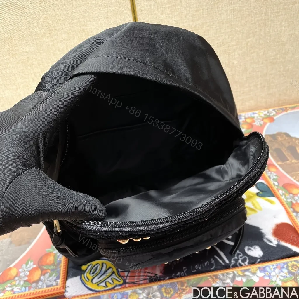 View 2 of Black Quilted Backpack with Colorful Logo Embellishments, All-Day Comfort