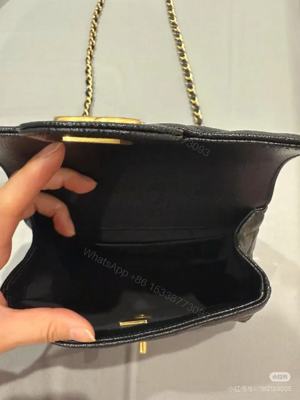 View 9 of Black Quilted Calfskin Flap Bag with Gold Chain - Compact Luxury Bag