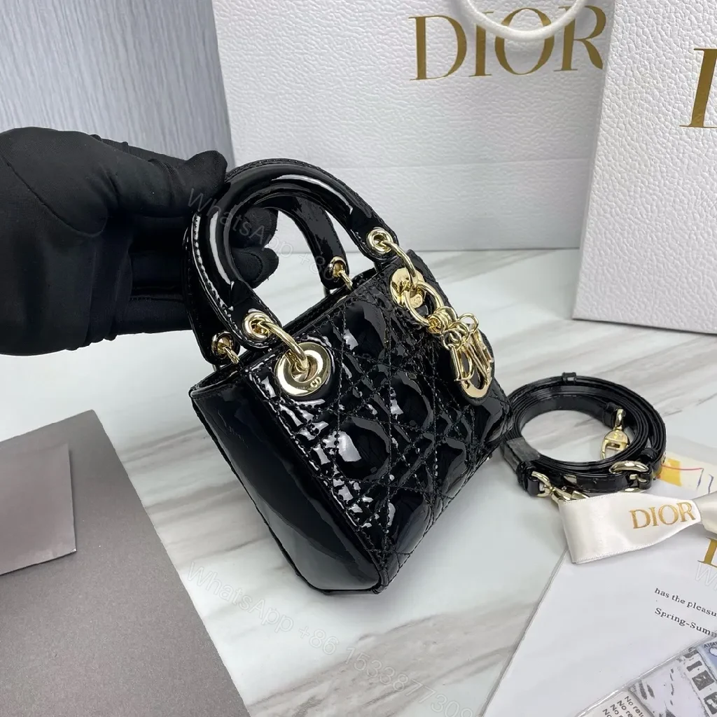 View 2 of Glossy Patent Top-Handle Bag – Gold Charm Accent, Mini Luxe