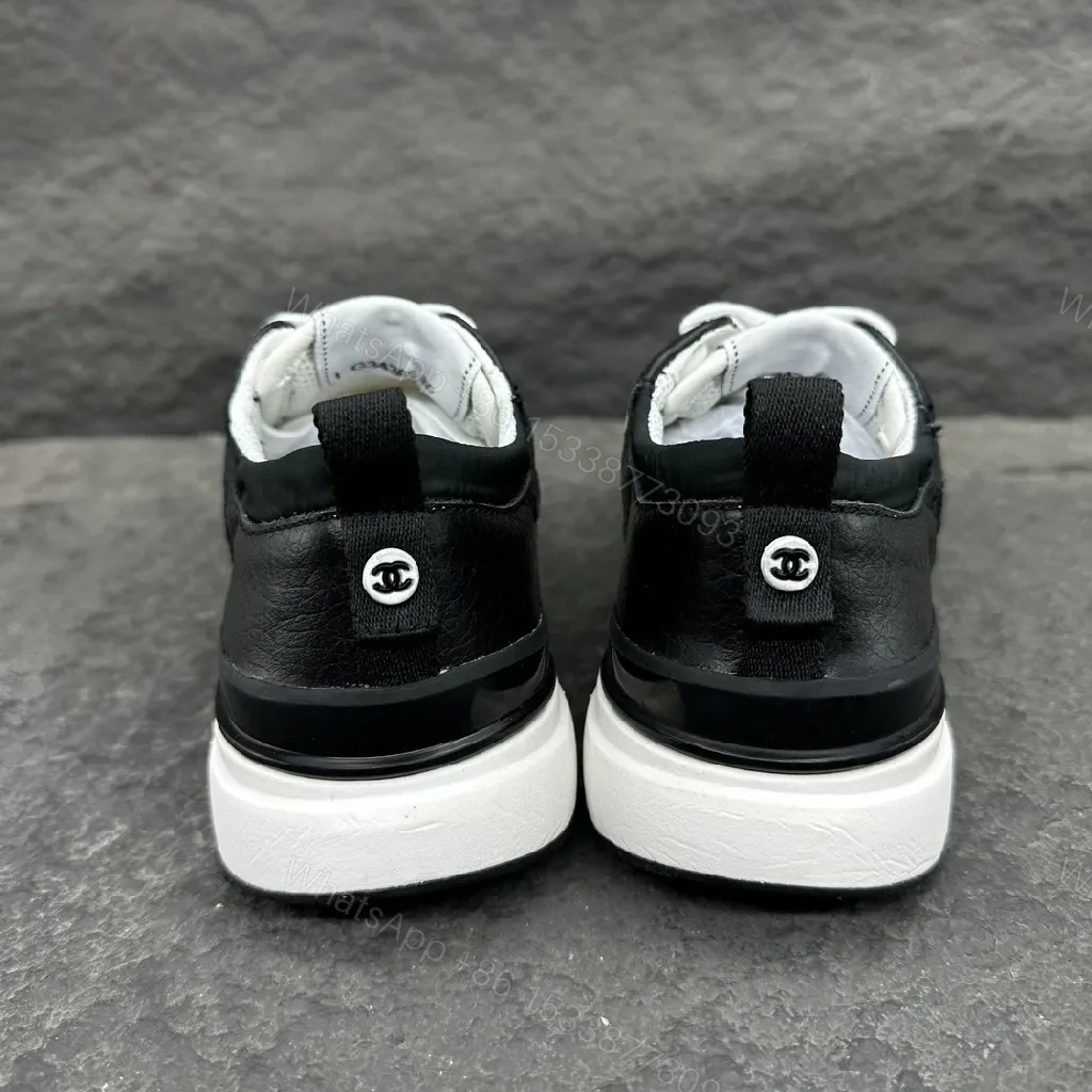 View 8 of Monochrome Leather-Textured High-Tops: Modern Luxury Sneakers