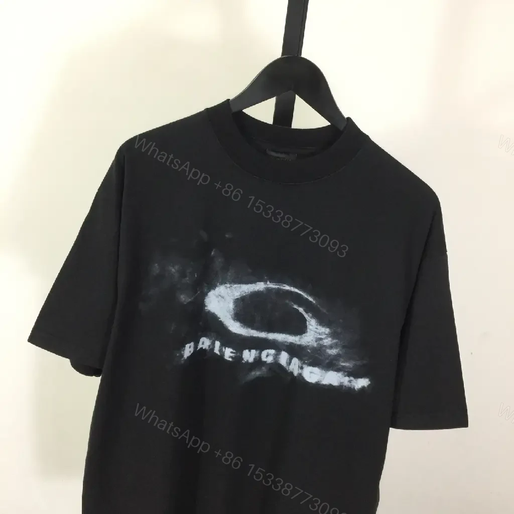 View 6 of Bold Graphic Tee with Distressed Logo: Luxe Streetwear Tee