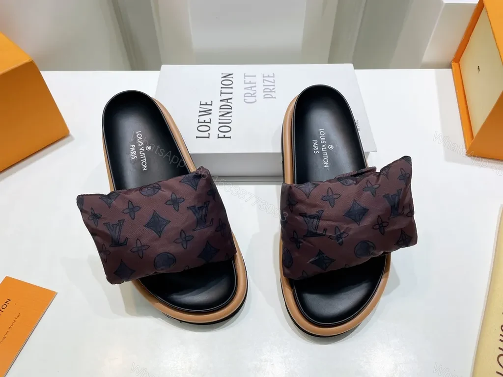 View 3 of Louis Vuitton Monogram Padded-Strap Slides: Sophisticated Comfort