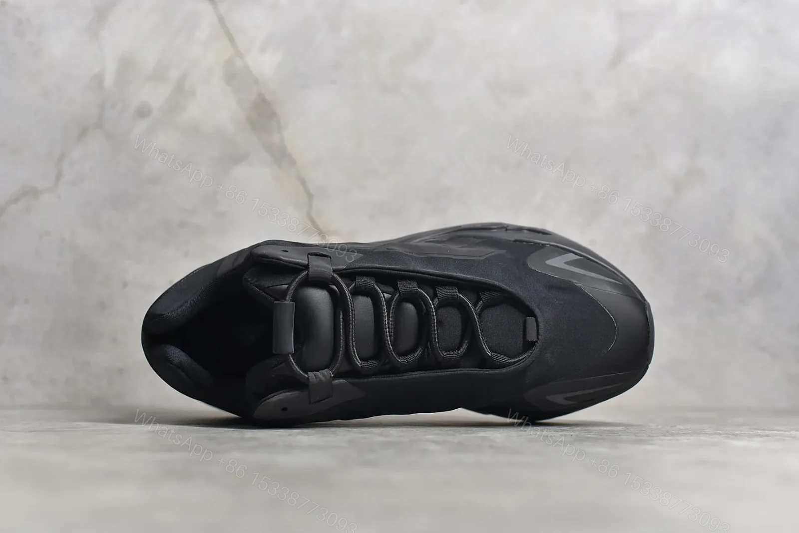 View 6 of Adidas Yeezy Boost 700 MNVN “Triple Black” Reps
