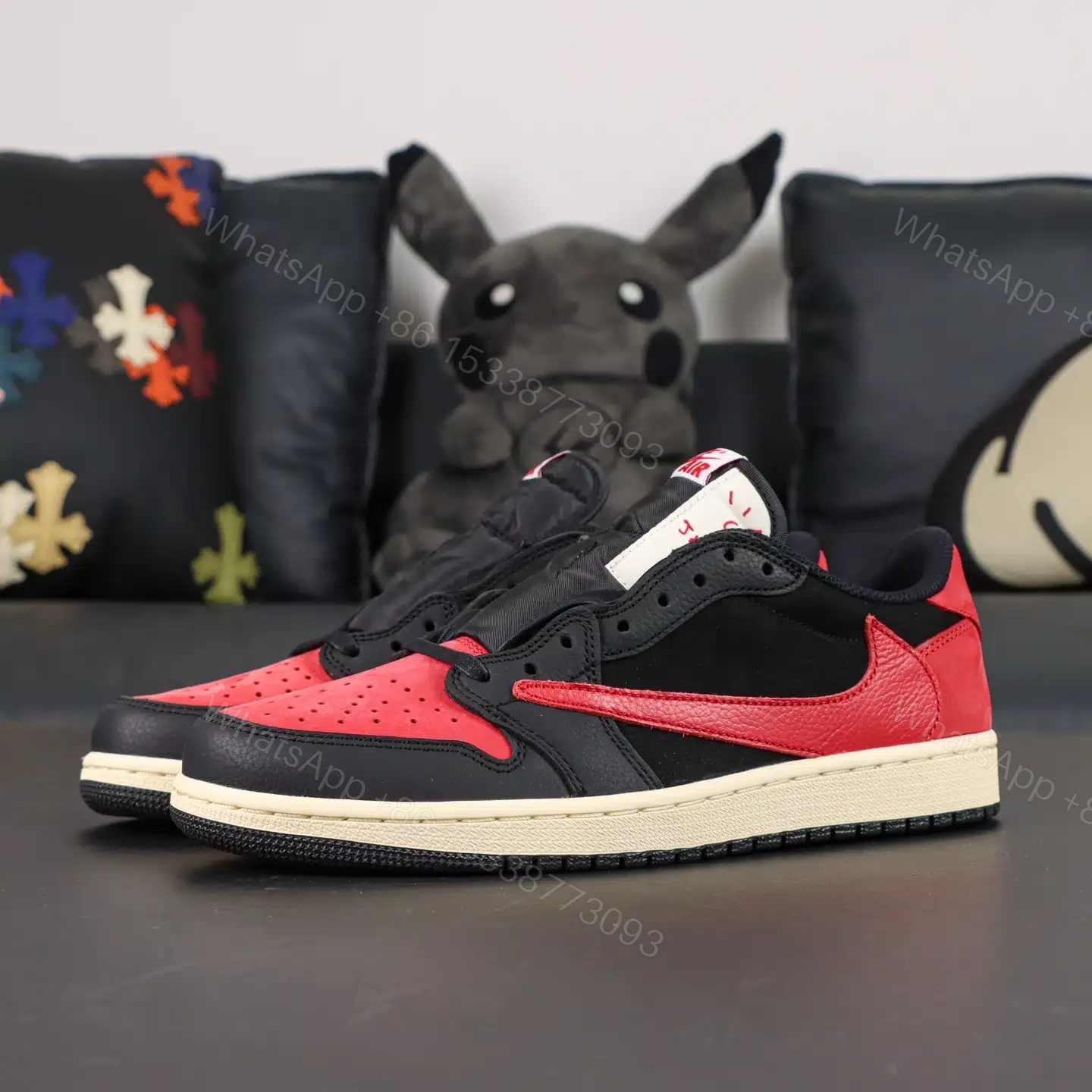 View 8 of Travis Scott x Jordan Air Jordan 1 Bred Reps