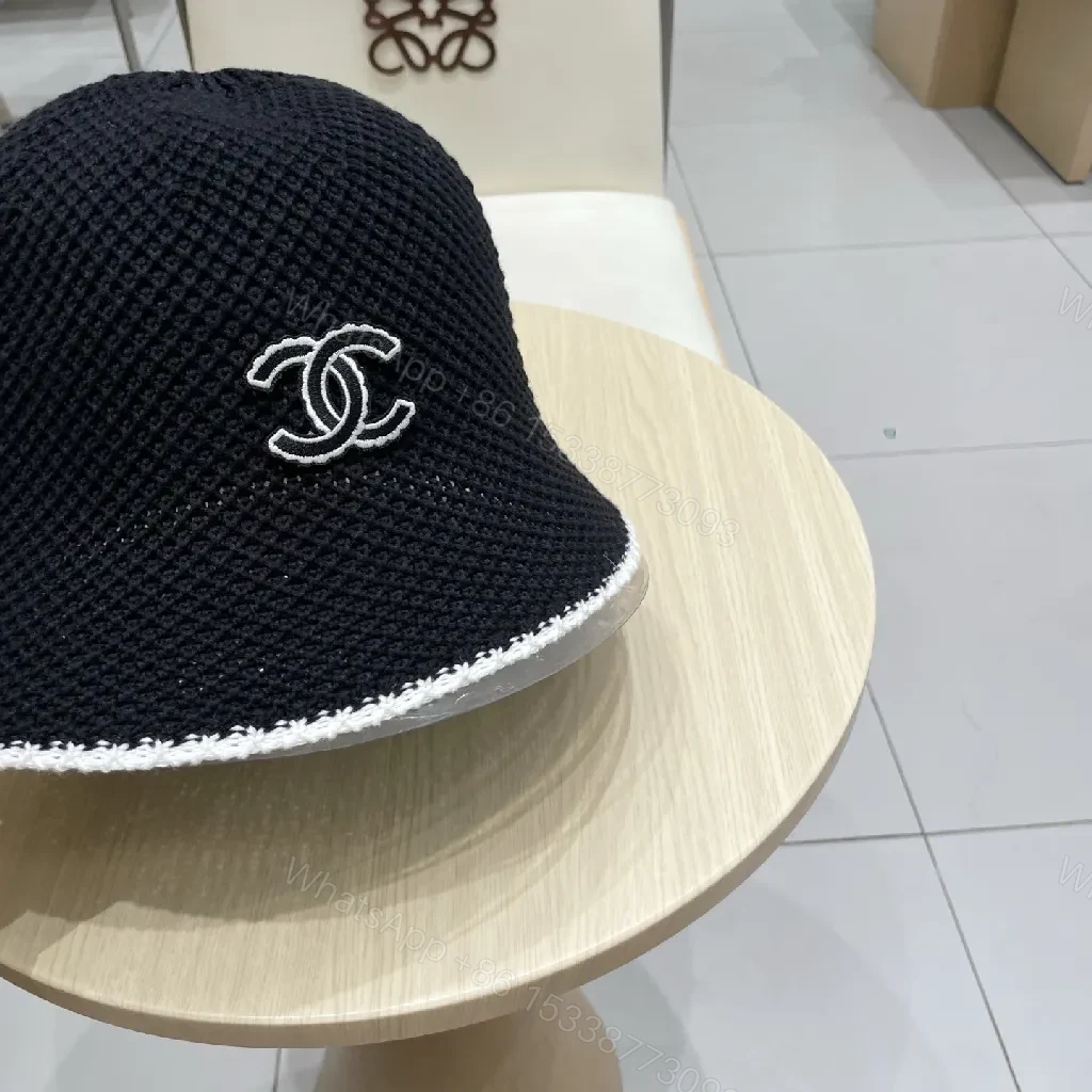 View 2 of Black Knit Bucket Hat – Luxe Parisian-Style with Subtle Emblem