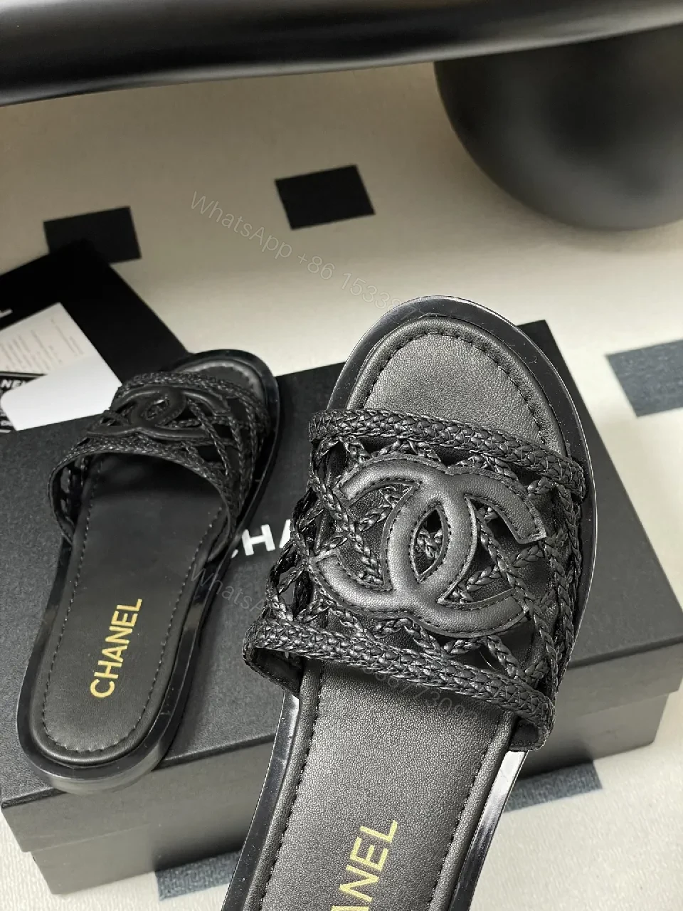 View 2 of Black Quilted Slide with Interlock Crest - Elevated Comfort Slipper
