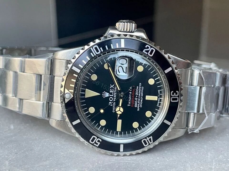 View 6 of VINTAGE Rolex Submariner Date Tiffany & Co 16610A30B9315 Black dial with SS bracelet
