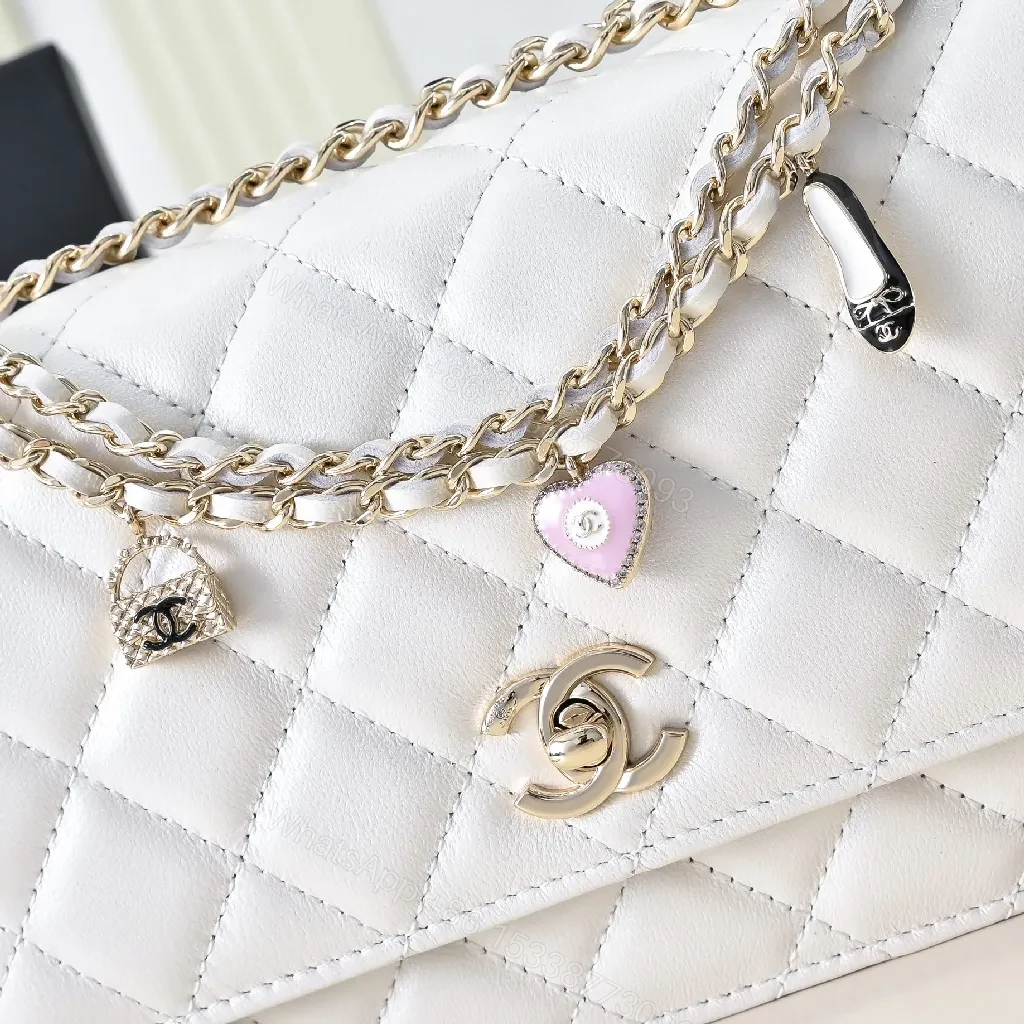 View 7 of Quilted Mini Bag: White Calfskin, Gold Chain, Luxe Silhouette