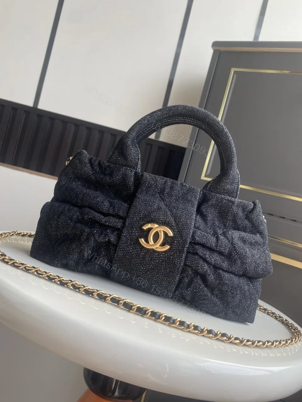 View 4 of Chic Black Denim Mini Bag with Gold Emblem