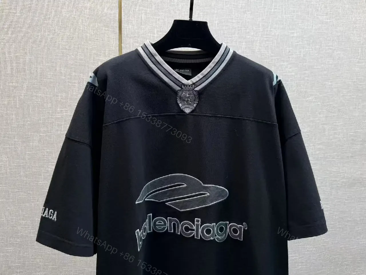View 2 of Bold Logo Knit: Oversized Streetwear with Hardware Details