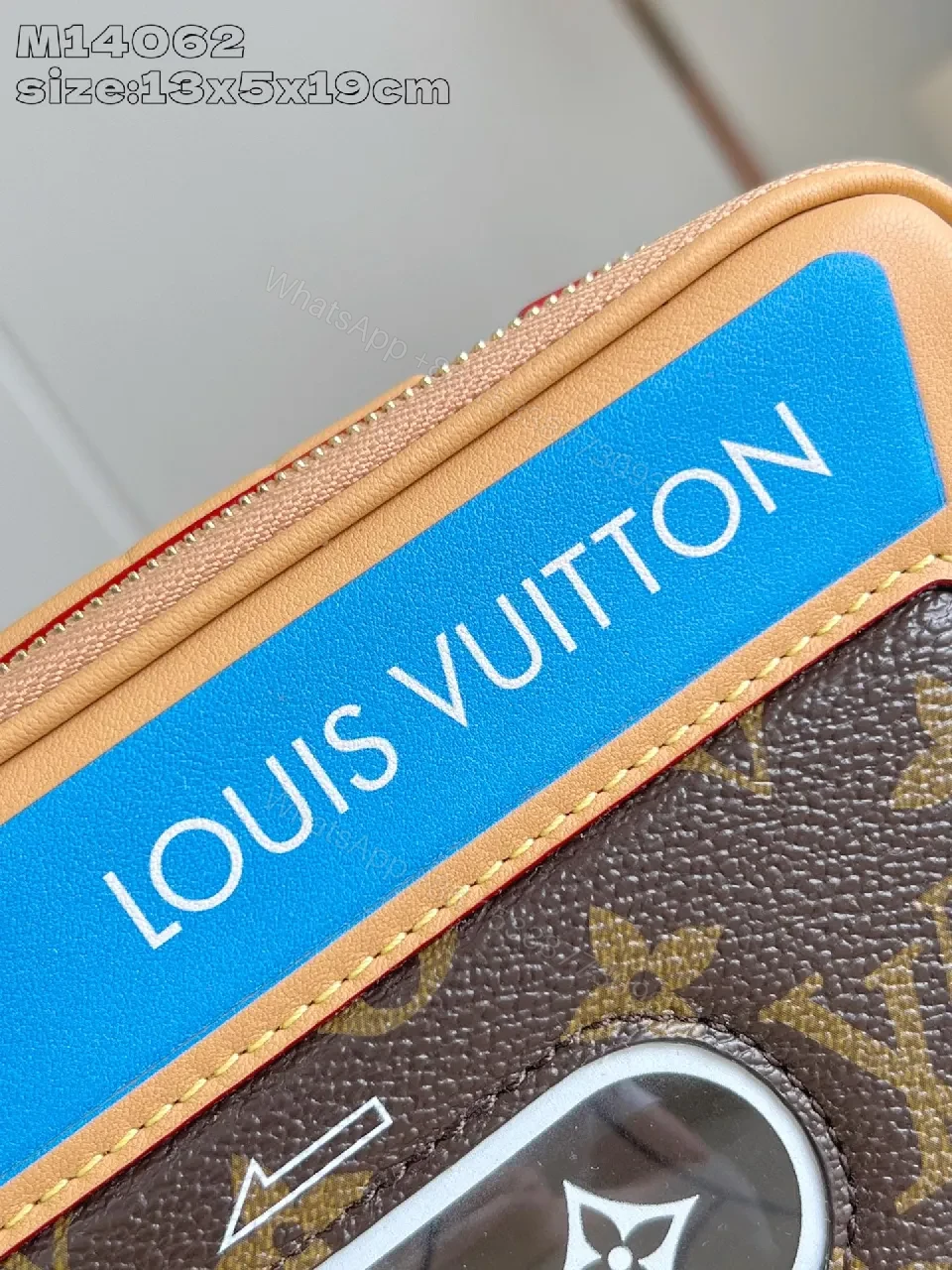 View 5 of Compact Luxury Crossbody: Monogram Canvas with Blue Accent and Gold Hardware