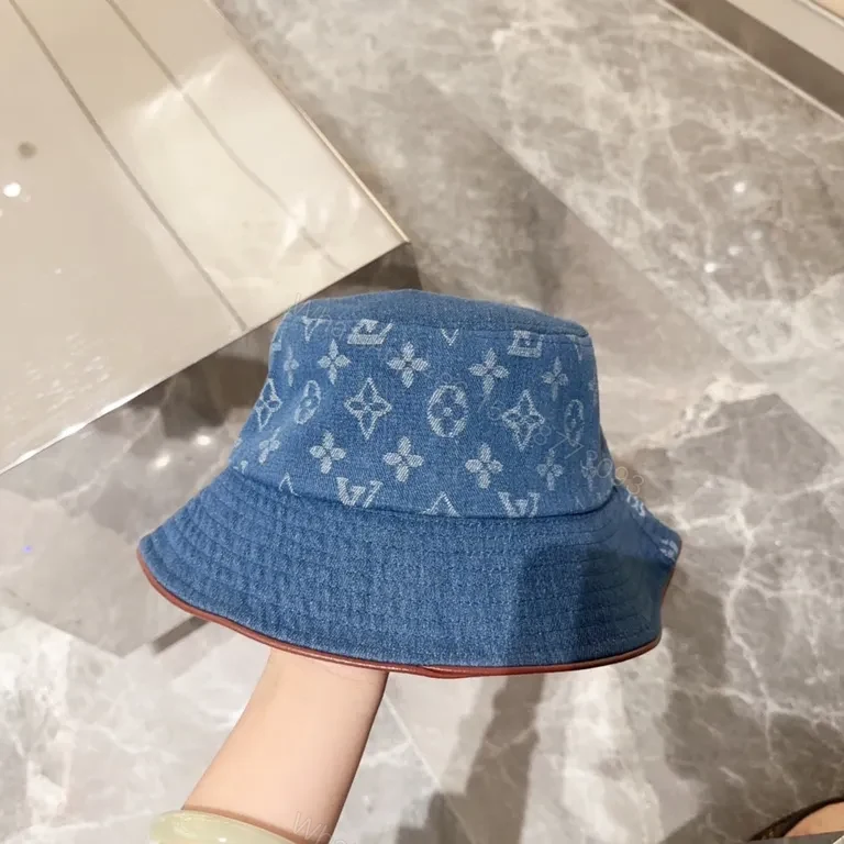 View 3 of Denim Bucket Hat with LV Monogram Accents - Modern Texture