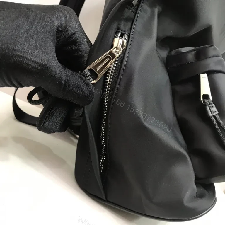 View 2 of Black Nylon Burberry Backpack â€” Minimalist, All-Day Comfort