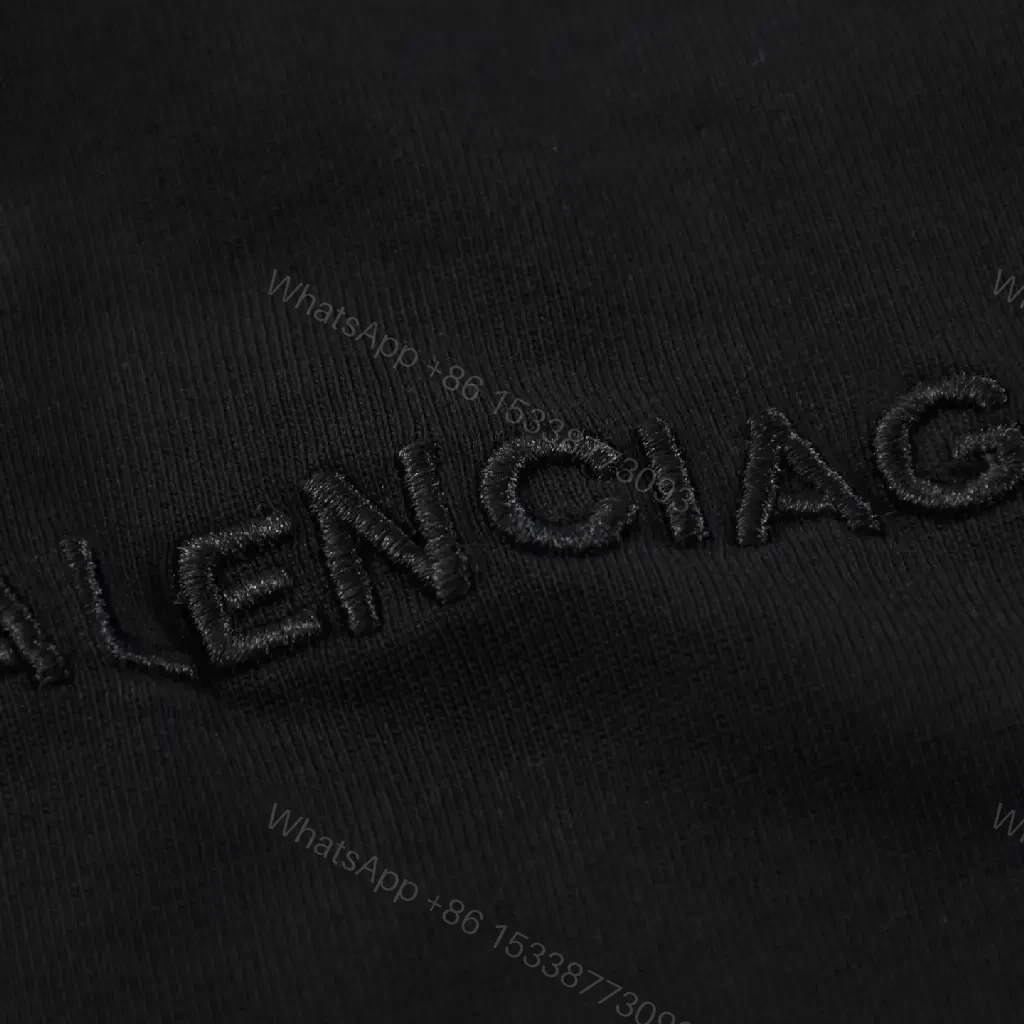 View 5 of Minimalist Black Cotton Tee: Subtle Luxury, Everyday Essential