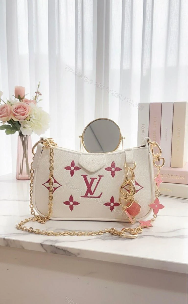 Louis Vuitton Monogram Empreinte Leather Bag Pink First Copy | AAA+ Replica — view 1