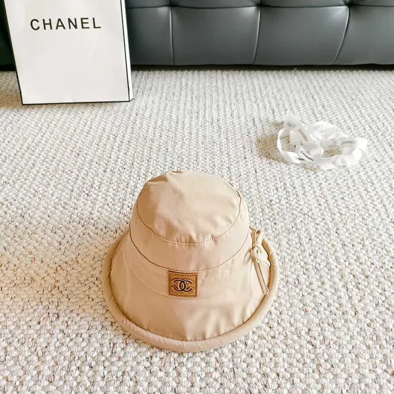 Beige Lightweight Bucket Hat with Logo Detail — view 1