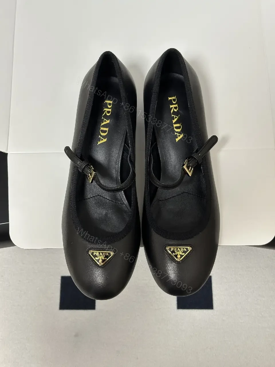 View 6 of Black Leather Mary Jane Heels with Logo Charm, Prada Style