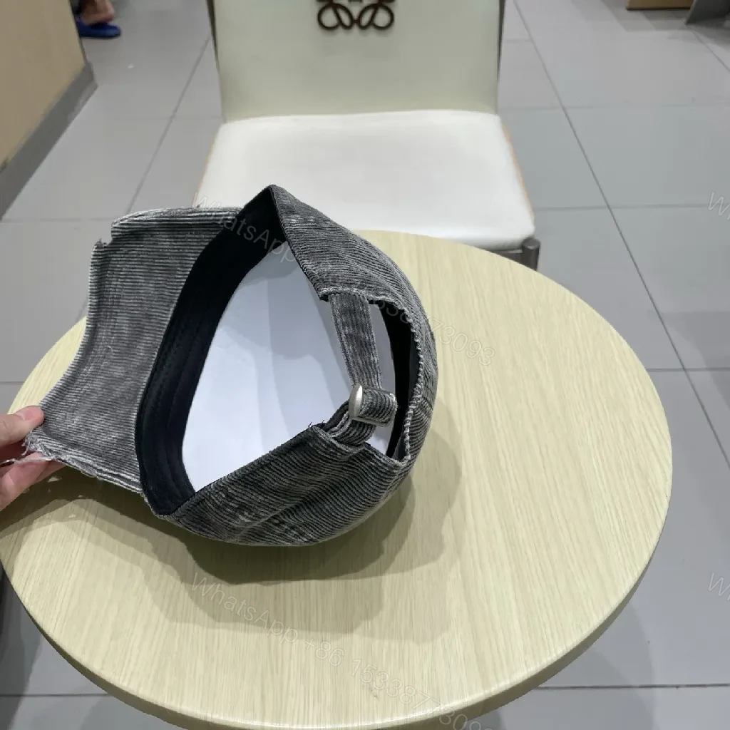 View 7 of Denim-Texture Cap with Monogram Emblem – Street-Ready Comfort