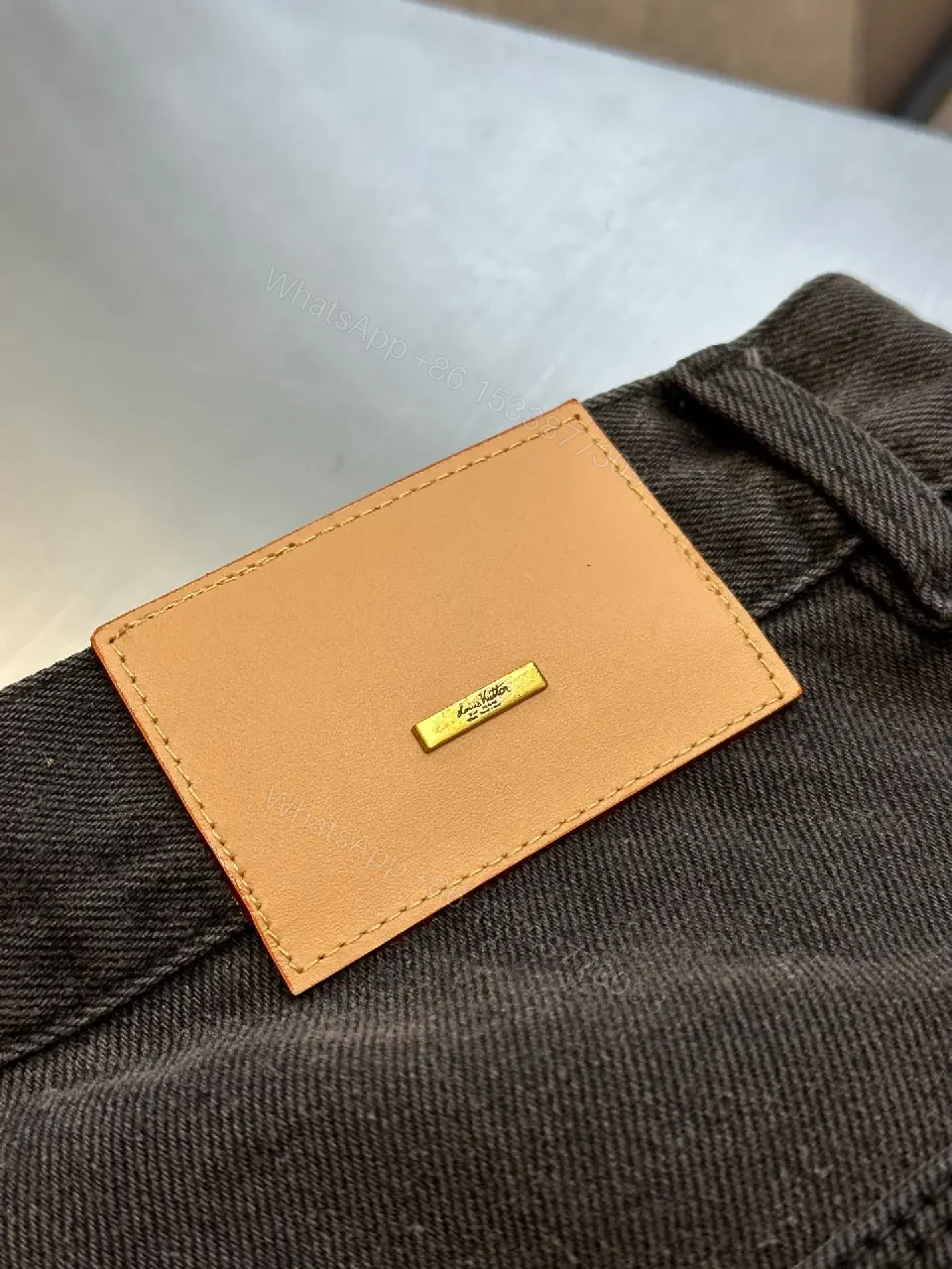 View 8 of Dark-Wave Denim Pant: Premium Monogram Texture, Modern Fit