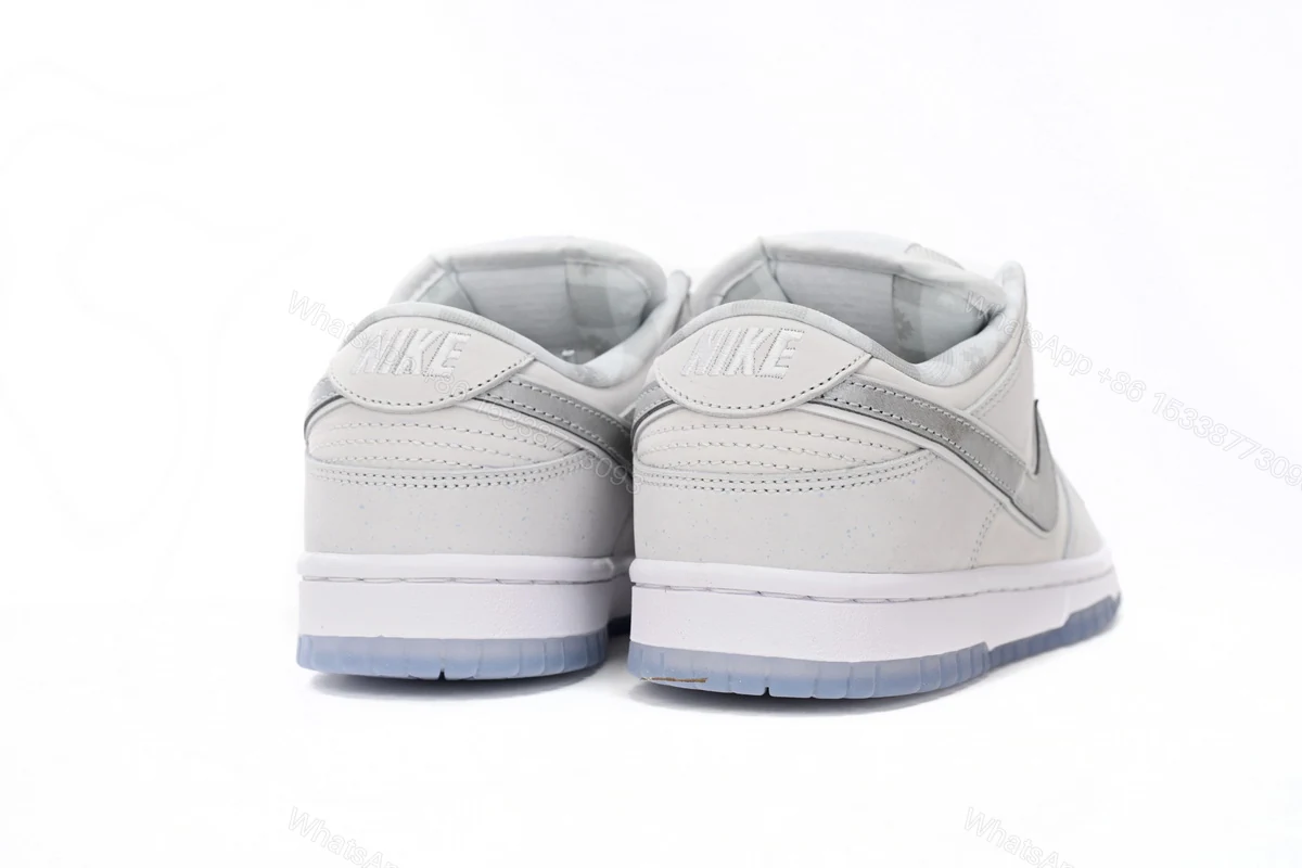 View 9 of CONCEPTS × Nike Dunk SB Low White Lobster FD8776-100