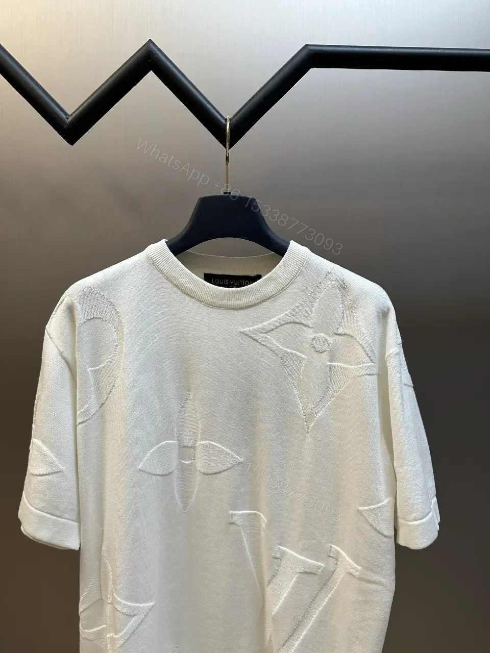 View 7 of Off-White Cream Oversized Tee with Embossed Logo Pattern
