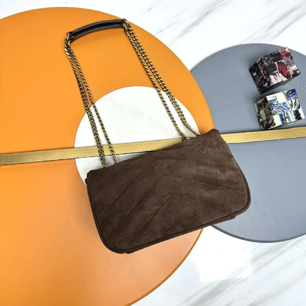 View 9 of Compact Suede Shoulder Bag with Gold Emblem - Textured Chic Everyday Luxury