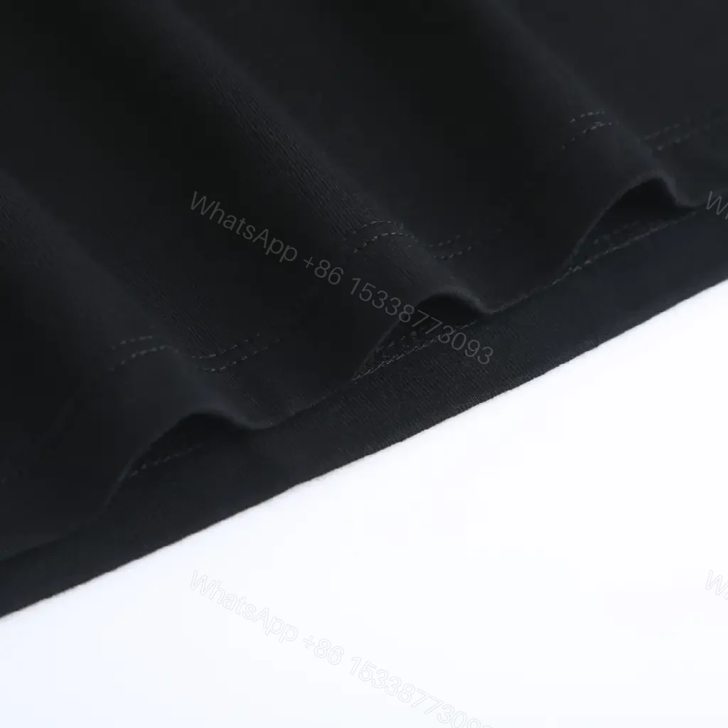 View 10 of Black Cotton Tee with Luxe Logo Graphic, Relaxed Fit, Premium Edge