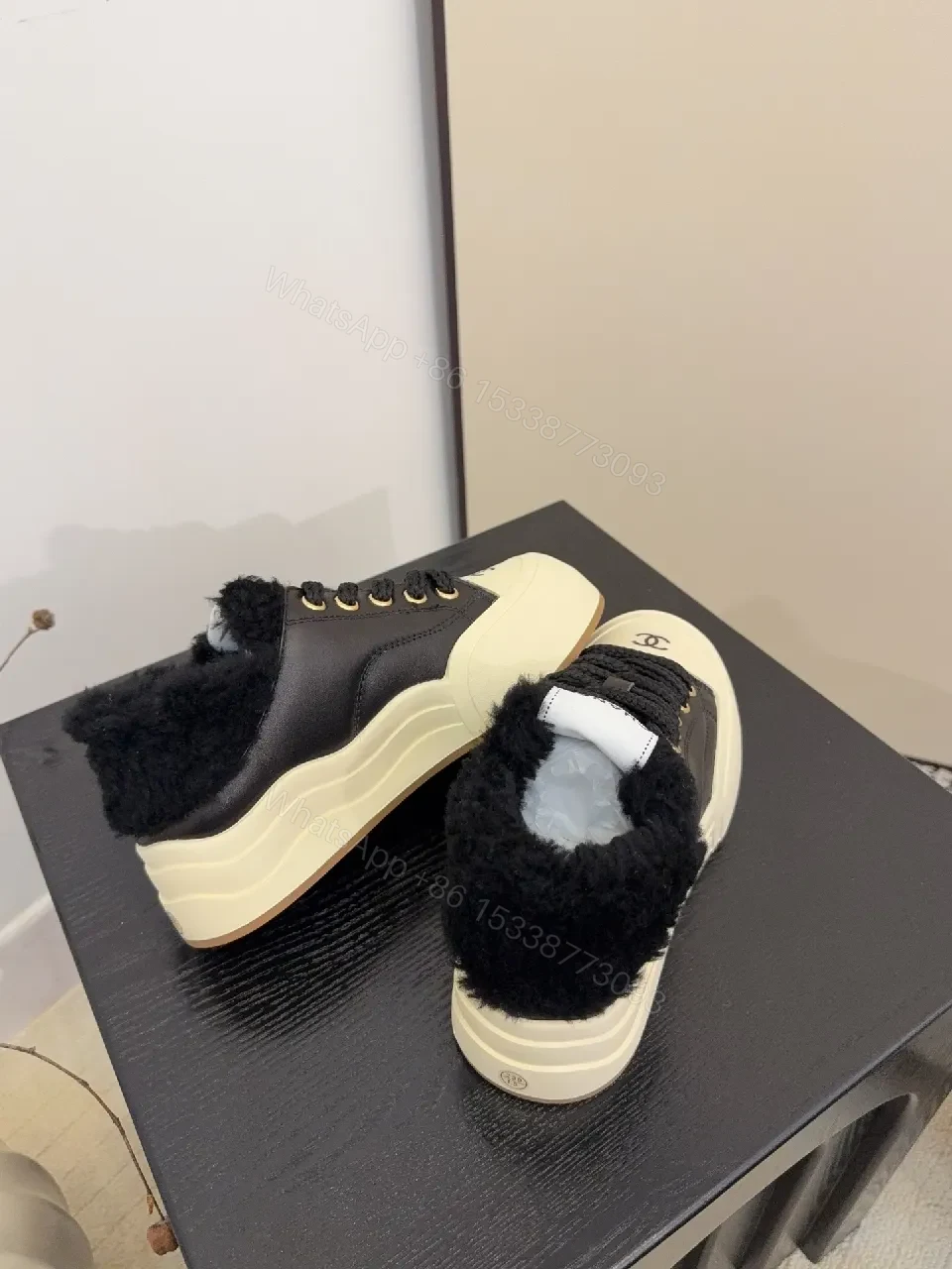View 2 of Chic Leather High-Top Sneakers with Plush Warmth and Accents