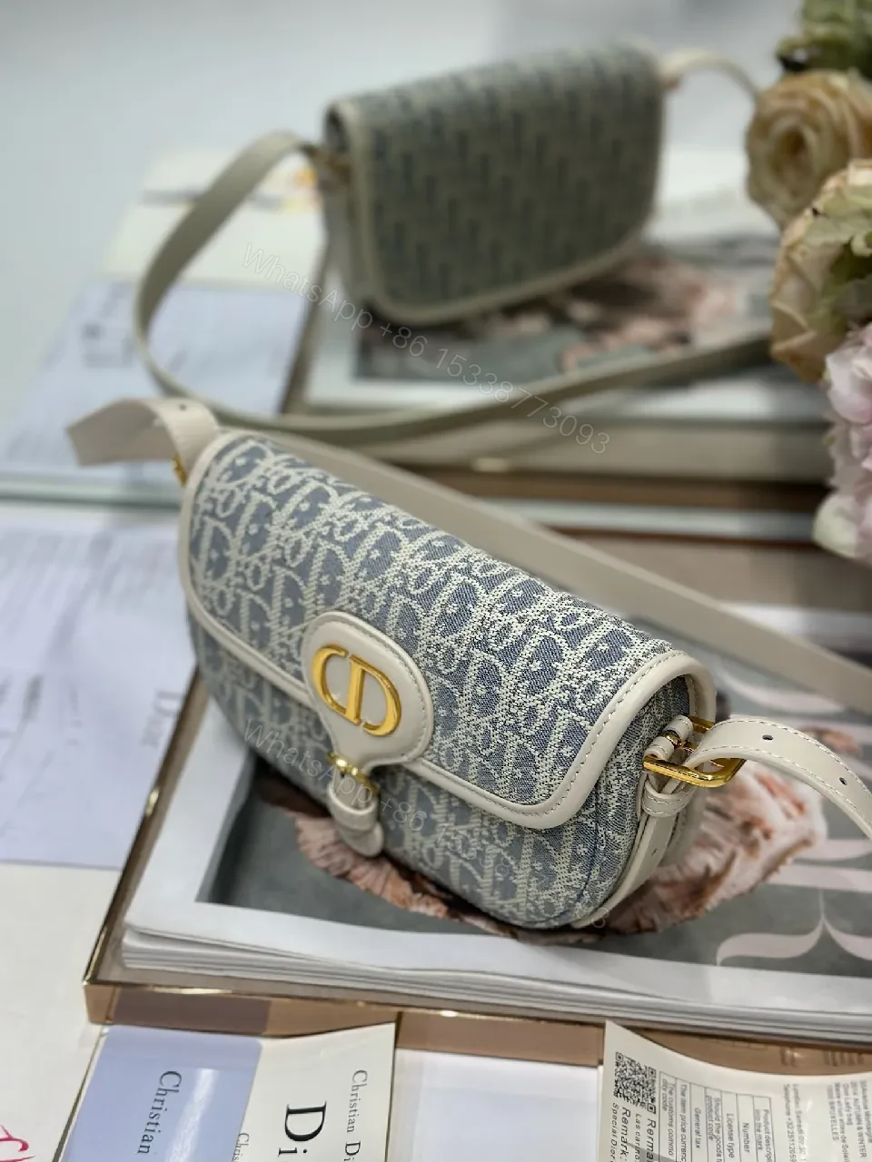 View 9 of Patterned Crossbody: Luxe Compact Elegance, Gold Hardware, Structured Flap