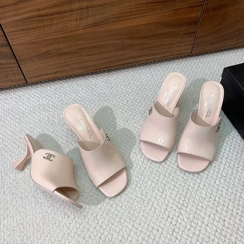 Powder Pink Patent Slides with Iconic Twist, Mid-Heel Elevation — view 1