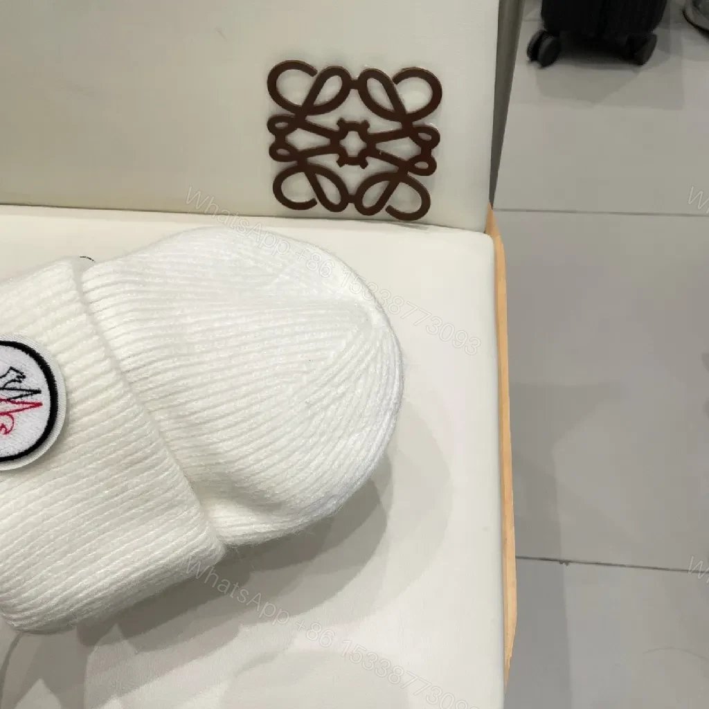 View 7 of White Knit Beanie: Ribbed Luxury, Crest Patch, All-Season