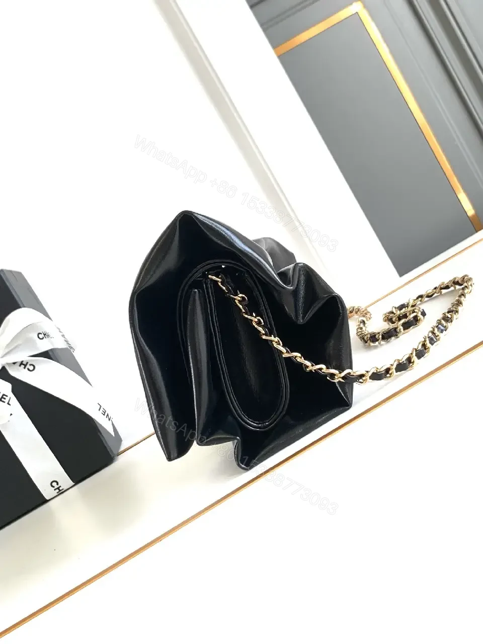 View 3 of Black Leather Ruched Clutch: Minimalist Glam, Gold Hardware, Evening-ready