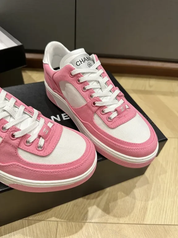 View 2 of Chic Pink & White Coach-Style Sneakers: Luxury Comfort