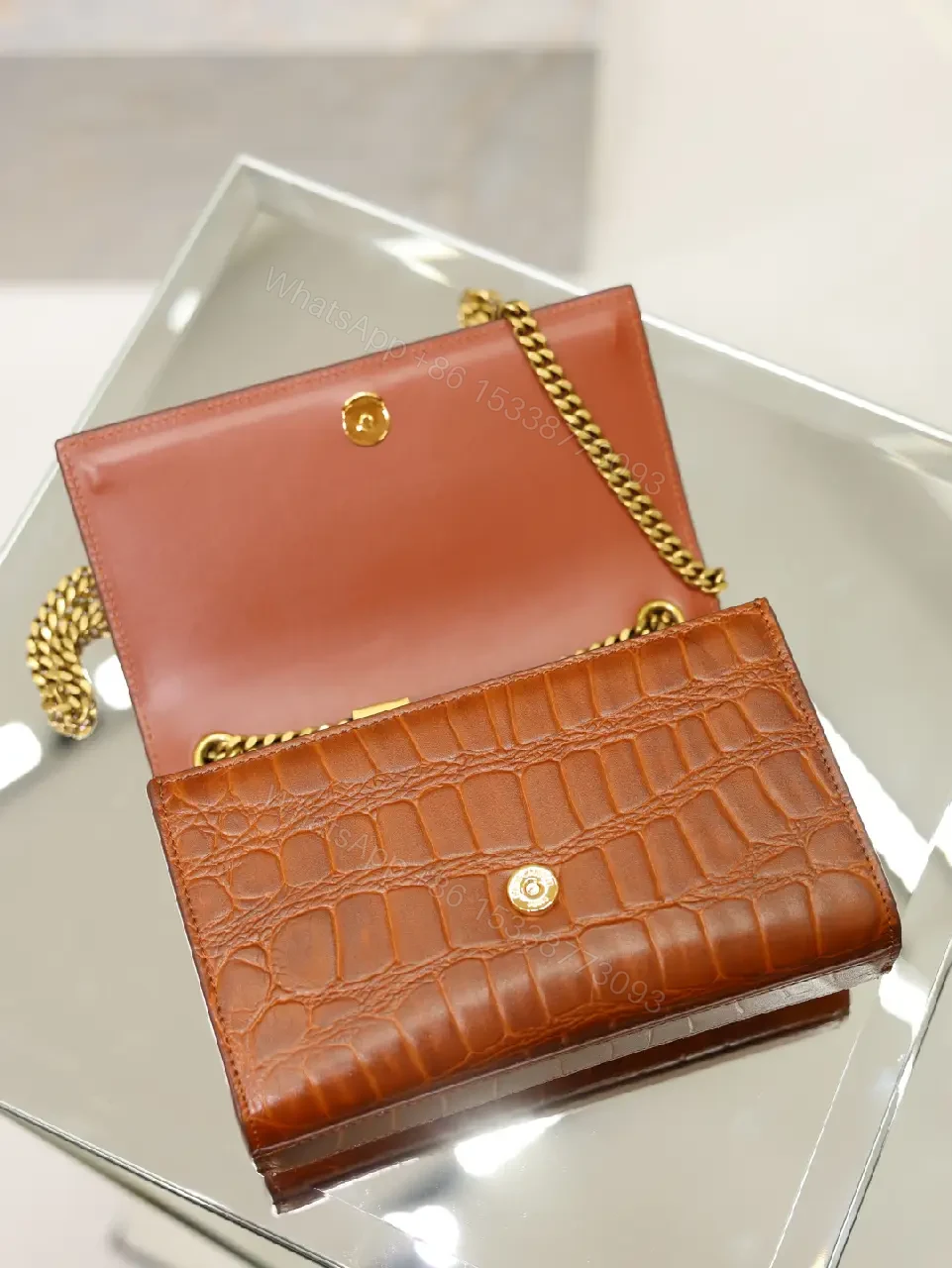 View 7 of Brown Crocodile-Embossed Leather Clutch with Gold Logo Clasp