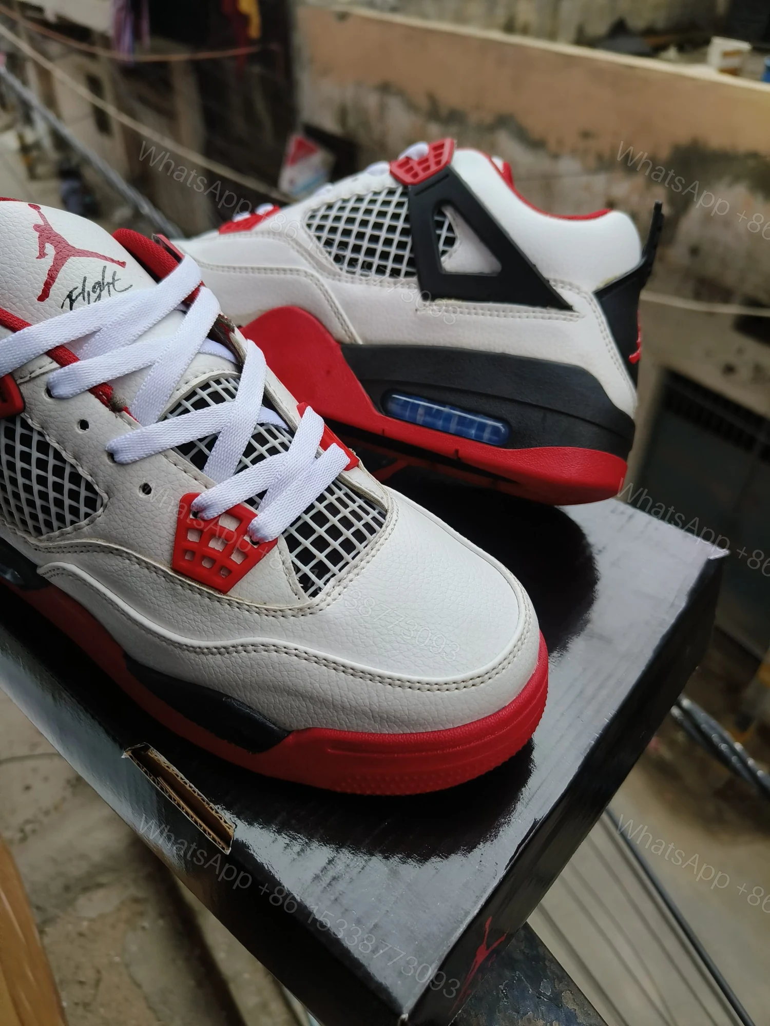 View 7 of BUY FIRST COPY NIKE JORDAN 4 “RED/WHITE” SNEAKERS