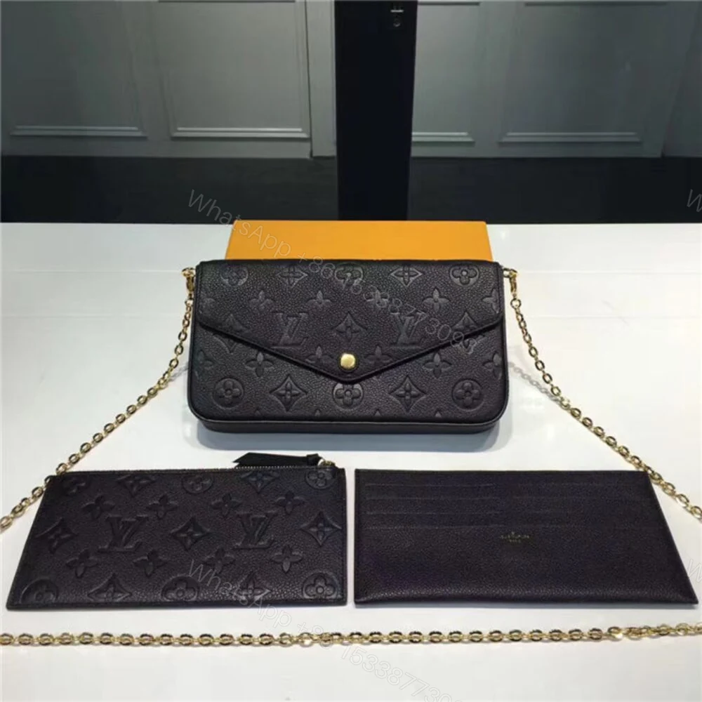 View 2 of Louis Vuitton Félicie Pochette Monogram Empreinte Black 21Cm M82477