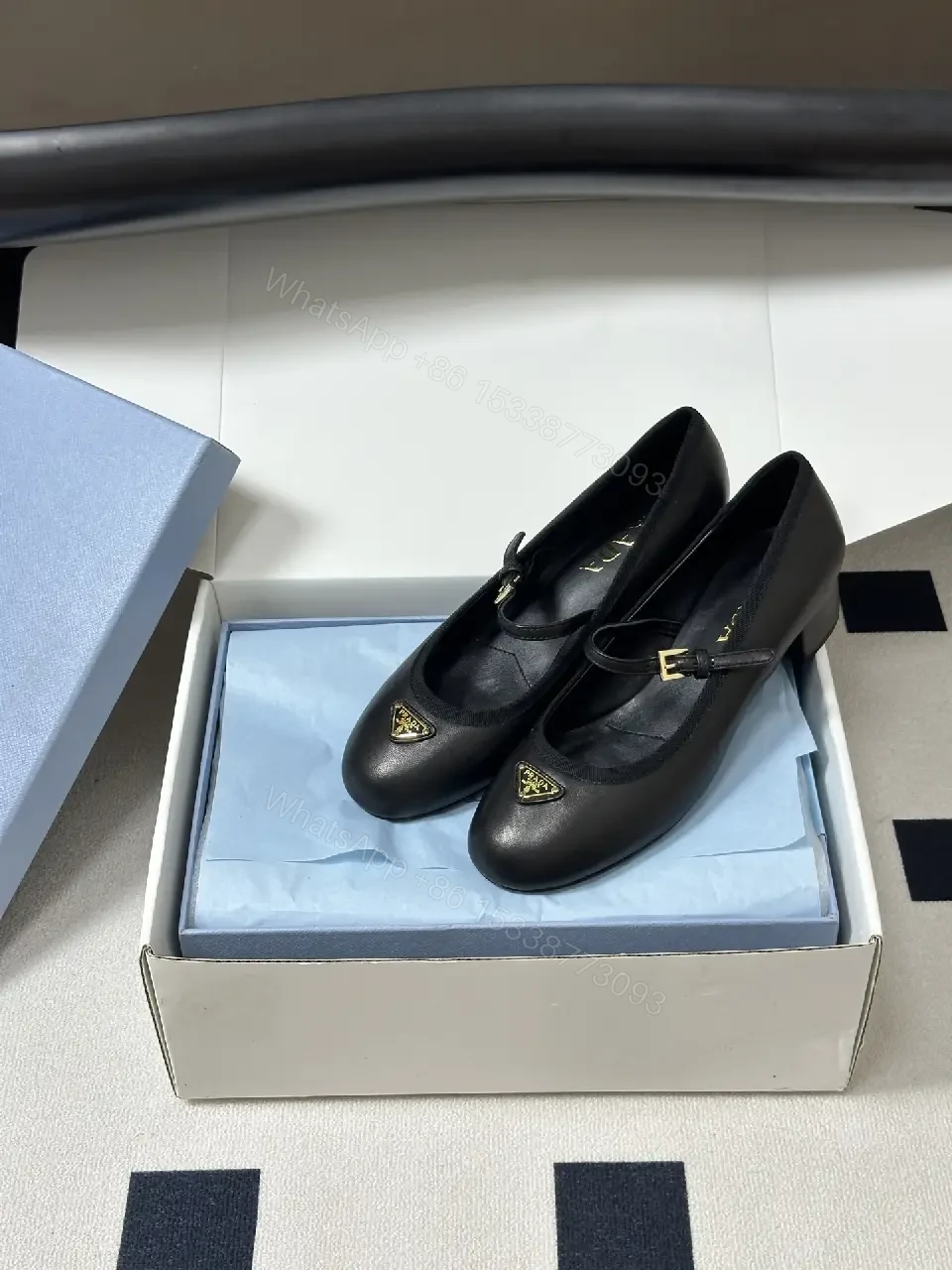 View 8 of Black Leather Mary Jane Heels with Logo Charm, Prada Style
