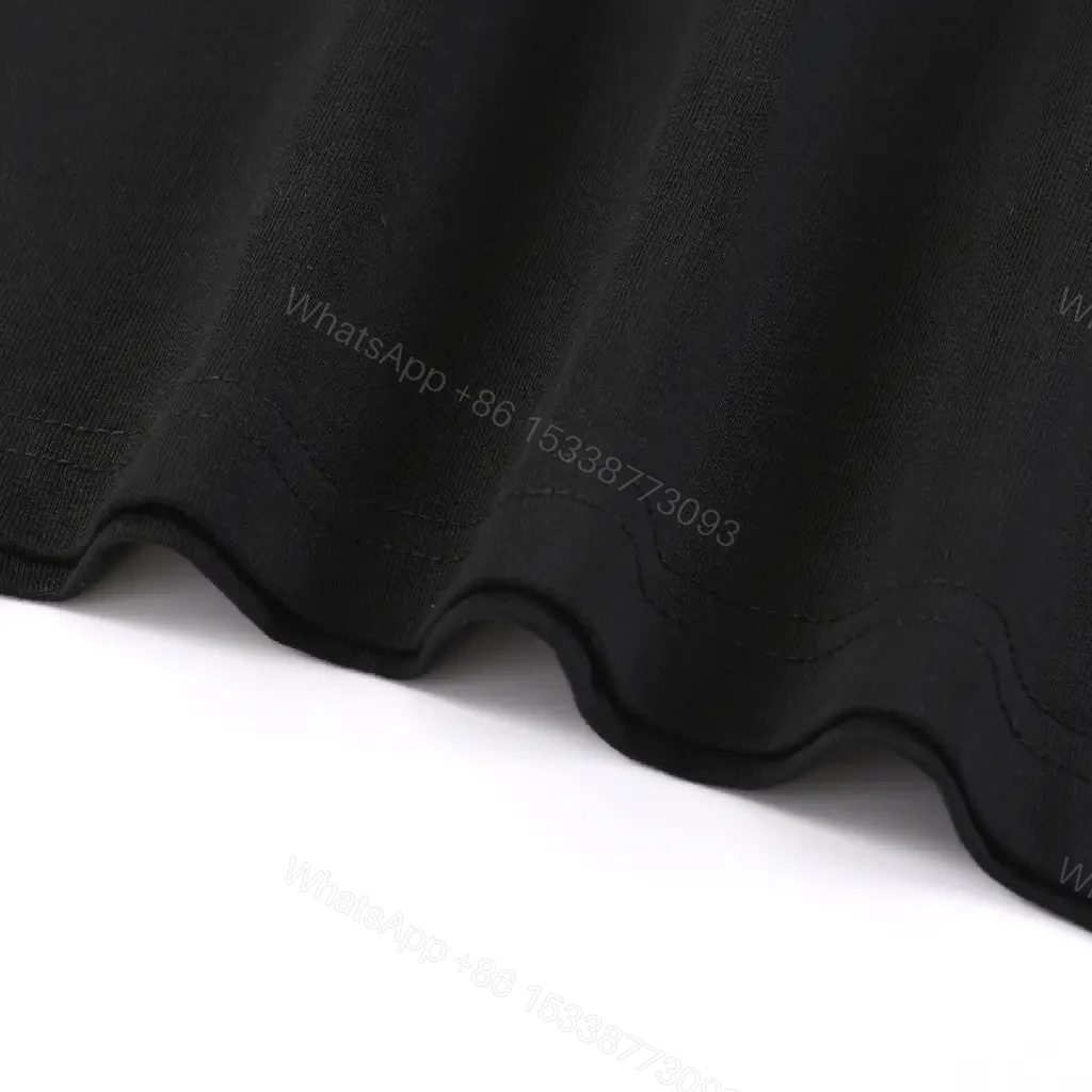 View 11 of Minimalist Black Cotton Tee: Subtle Luxury, Everyday Essential