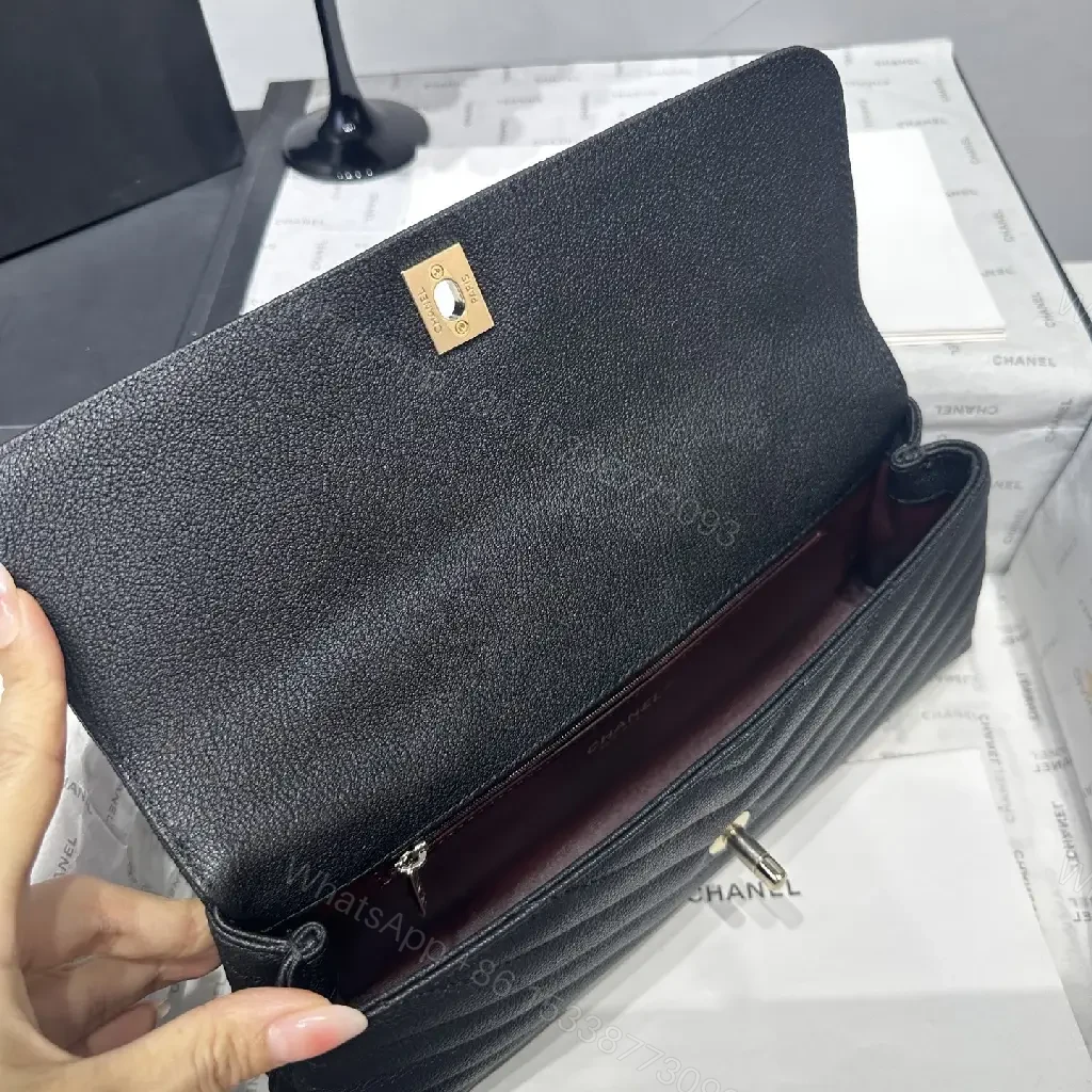View 2 of Chic Quilted Leather Handbag: Gold Logo Compact Bag